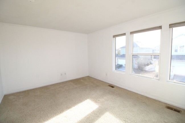 Building Photo - Updated 3bed/2.5bath/2car garage across fr...
