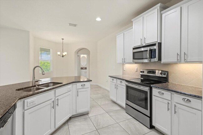 Building Photo - 12133 SW Aventino Dr