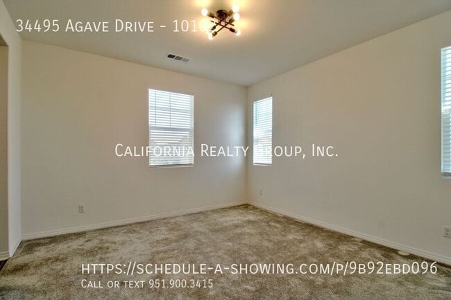 Building Photo - 34495 Agave Dr