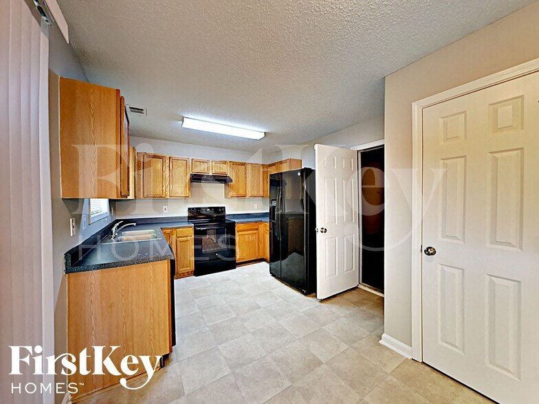 Building Photo - 6958 Mahonia Pl