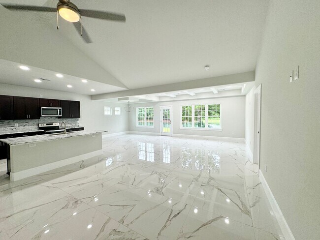 Building Photo - LOOK AT THIS ONE! BEAUTIFUL home with a pond view right outside the back patio!