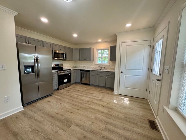 Building Photo - The Home You’ve Been Searching For! *Utilities & Furniture can be added with a rental premium.*