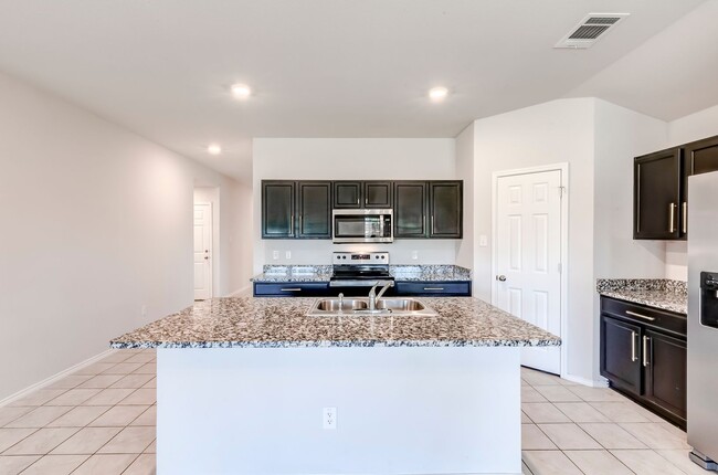 Building Photo - 9705 Kensley Rose Dr