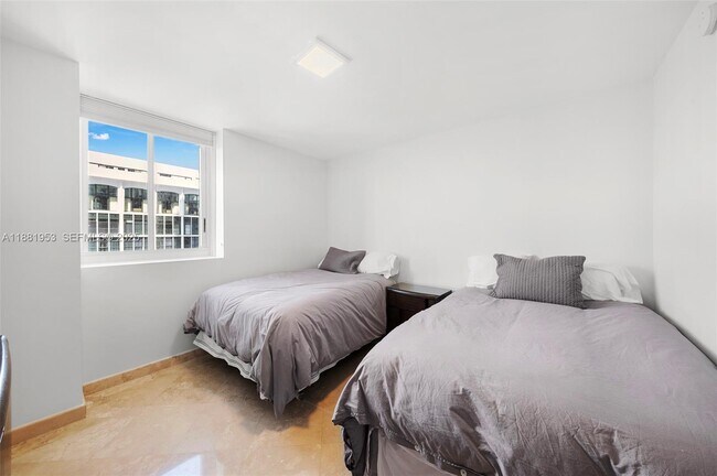 Building Photo - 4779 Collins Ave