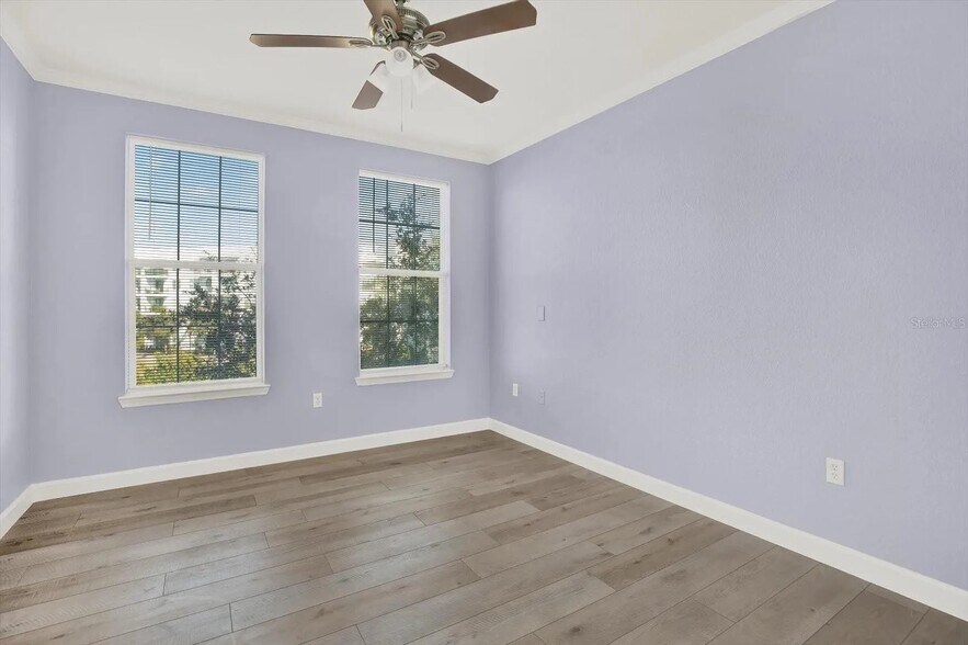 Bedroom with ceiling fan - 4221 W Spruce St