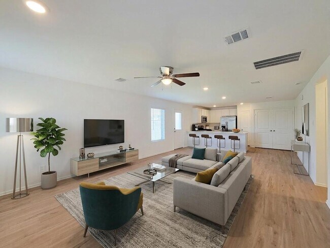 Building Photo - This single-story home has a comfortable layout with three bedrooms and a living area all on one ...