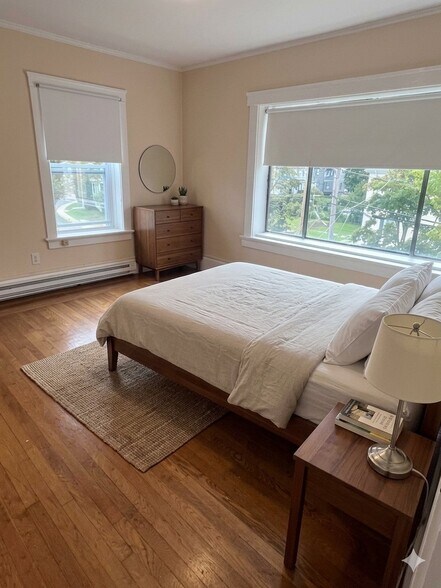 Sunny bedroom with a top floor view! - 144 Van Zandt Ave