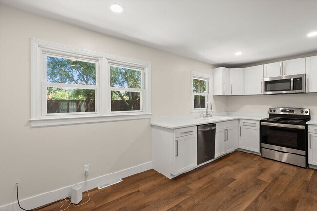 Building Photo - Spacious Split-Level Living with Dual Fireplaces & Expansive Deck