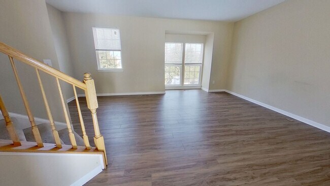 Building Photo - Spacious 3-Story Townhouse with One-Car Garage