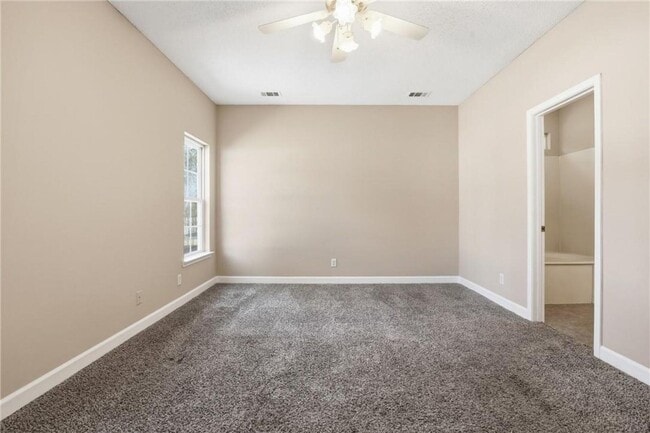 Building Photo - 4-Bedroom Home in Wild Heron with Front Porch and Fenced Yard