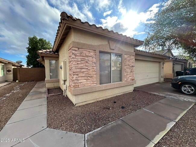 Building Photo - 10857 E Wier Ave