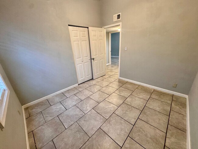 Building Photo - Charming 3-bedroom, 1-bath home featuring an attached carport and a fully fenced backyard—perfect...