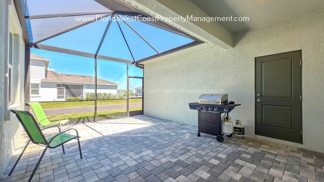 Building Photo - EXCEPTIONAL AND SPACIOUS FURNISHED TOWNHOME WITHIN WATERSIDE- NAUTIQUE!