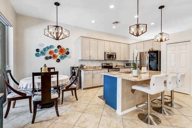 Building Photo - ** REFLECTION LAKES ** 4 BED / 2 BATH - PO...