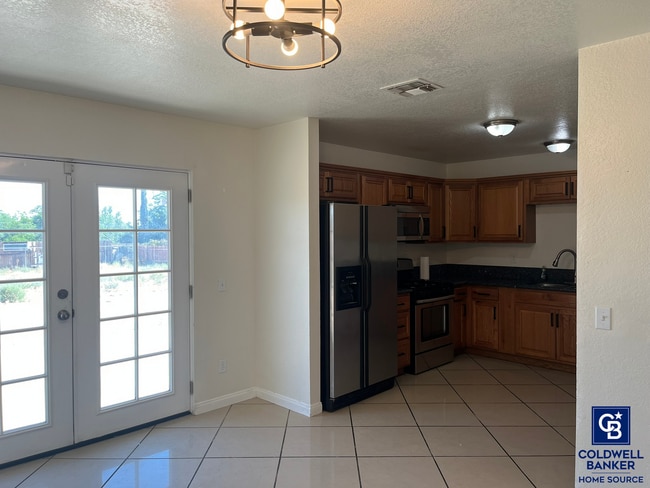 Building Photo - Move-In Ready Beauty with Granite Kitchen, Stainless Steel Appliances & Expansive Backyard
