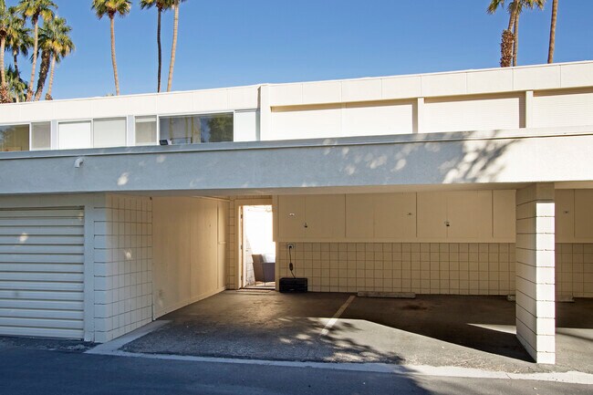 2 parking spaces with Electric Charger - 501 Desert Lakes Cir