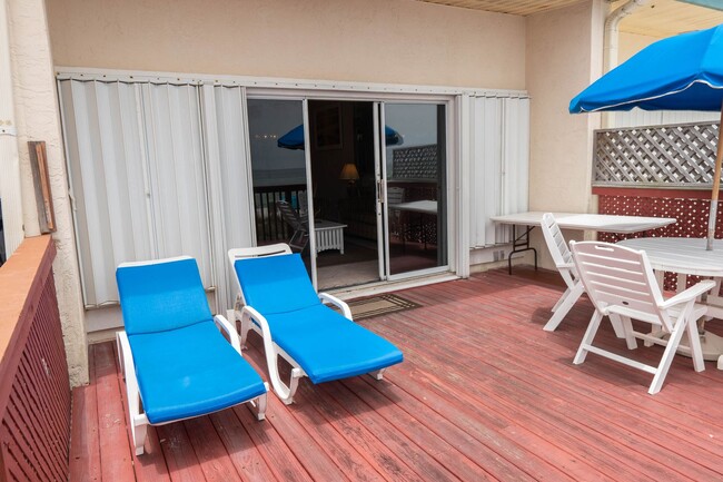 Building Photo - Stunning Beachfront 3-Bedroom Townhome!