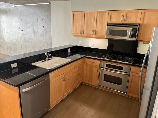 Building Photo - Large Beautiful Loft at highly desired Doma building in Little Italy