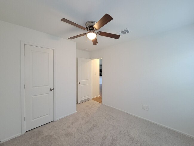 Building Photo - This single-story home has a comfortable layout with three bedrooms and a living area all on one ...