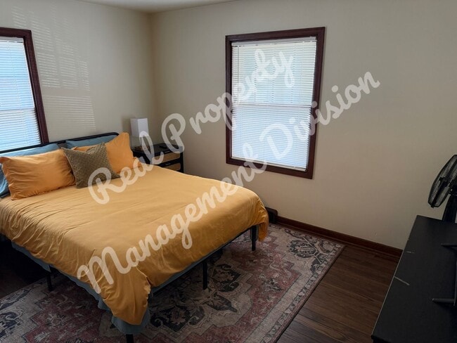 Building Photo - **Charming 2-Bed, 1-Bath Home with Retro Flair + Garage & Yard**