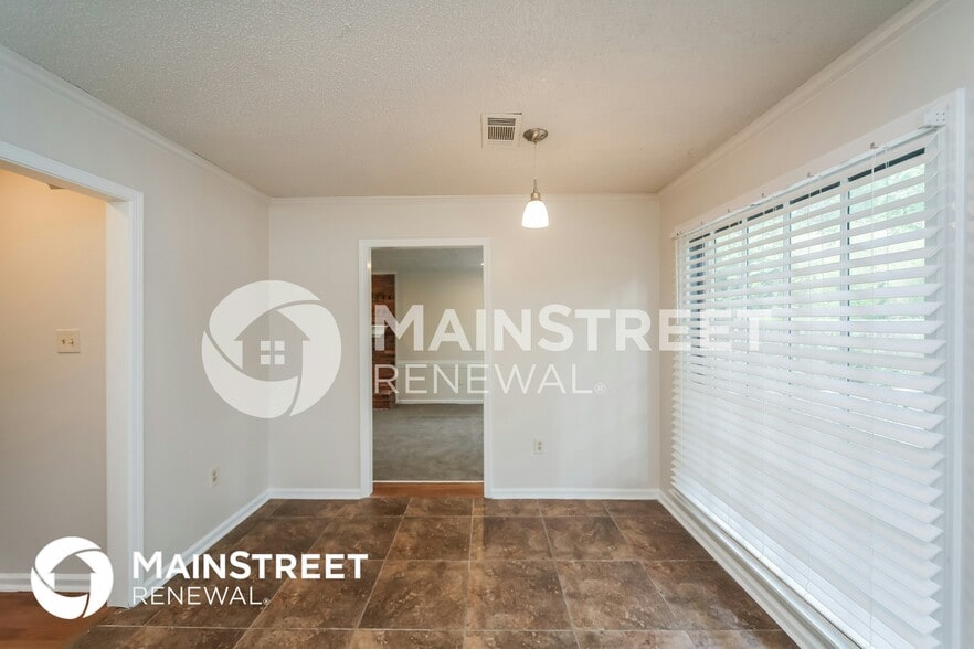 Building Photo - 8849 Woodmark Dr