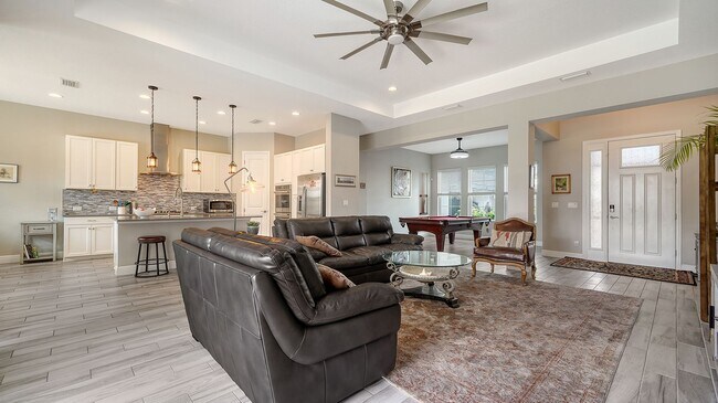 Building Photo - Furnished 4-Bedroom Home with Pool in The Sought After Neighborhood Of Rivo Lakes!!