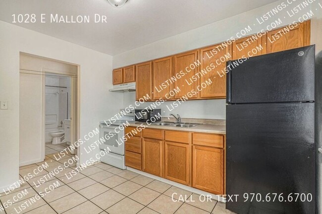 Building Photo - 1028 E Mallon Dr