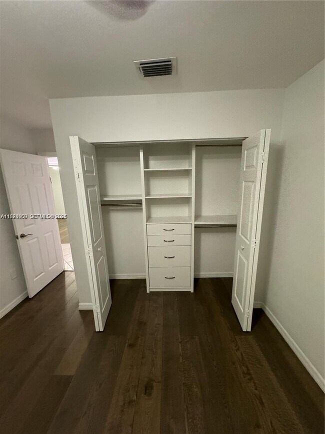 Building Photo - 8965 SW 59th Ct