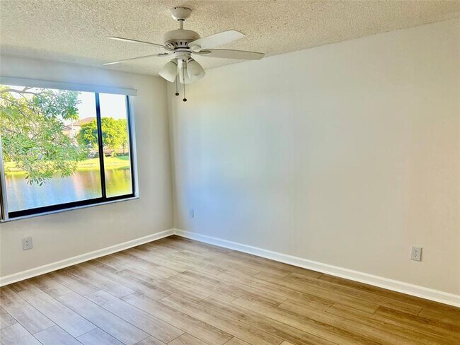 Building Photo - 9767 N Belfort Cir