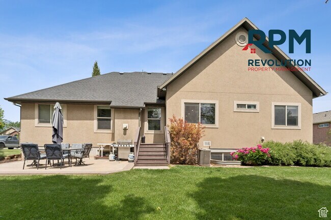 Building Photo - "Spacious 6-Bed Gem with Granite Touches & Cozy Fireplace in Morgan!"