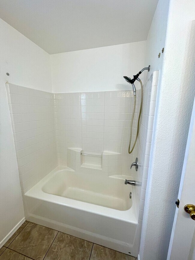 Building Photo - Inviting 3 Bedroom Home with RV Parking an...