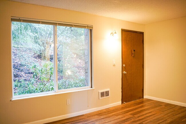 Building Photo - Spacious 1-Bed Surrounded by Tall Trees & Just Blocks from Popular Multnomah Village!