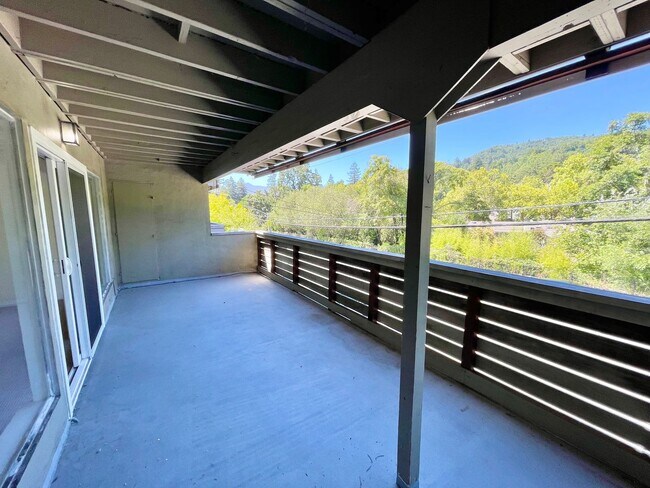 Building Photo - Sunlit 2BD/1BA w/ Private Balcony + Backyard! New Carpet! Assigned Parking! PROGRESSIVE