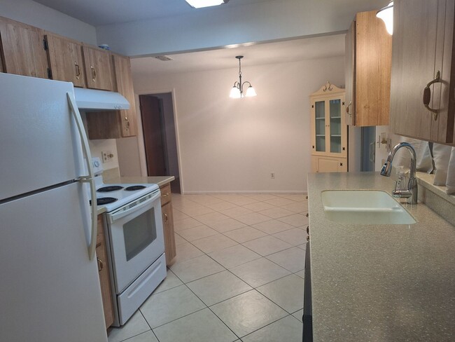 Building Photo - PELICAN COVE WEST 2BR 2BA WITH GARAGE FOR RENT