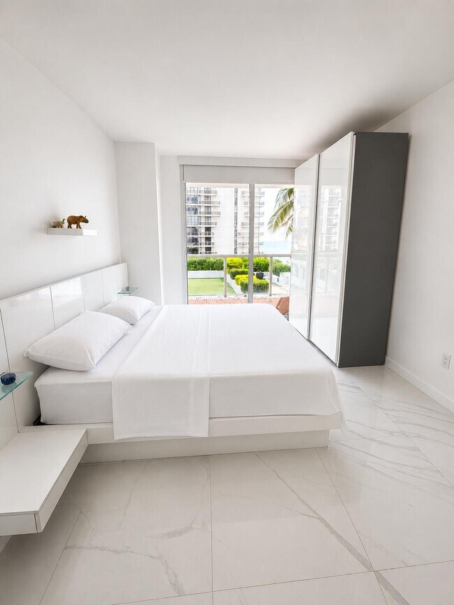 Building Photo - 6365 Collins Ave