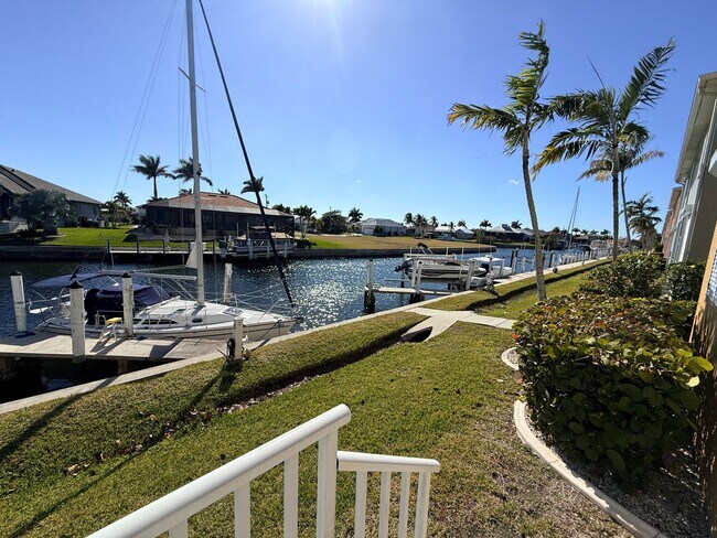 Building Photo - Waterfront Condo 3/2/1 - FULLY FURNISHED! - (Available annually or monthly)