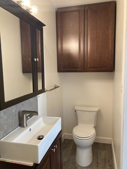 Bathroom with large storage cabinet - 512 S Broadway