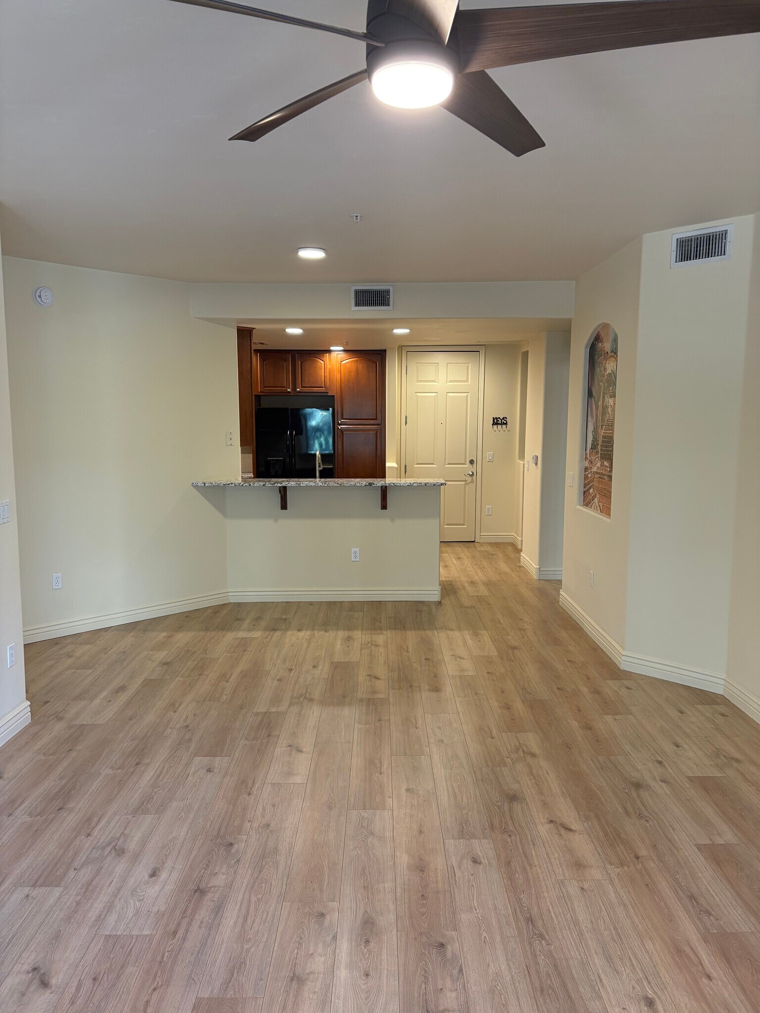 View from living room to kitchen - 5450 E Deer Valley Dr