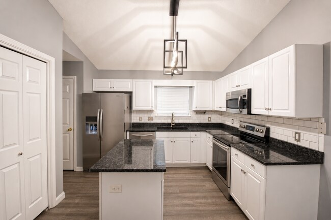 Building Photo - Updated 3BR/2BA Solar Home with No Carpet, Granite Countertops, Stainless Appliances & Spacious B...