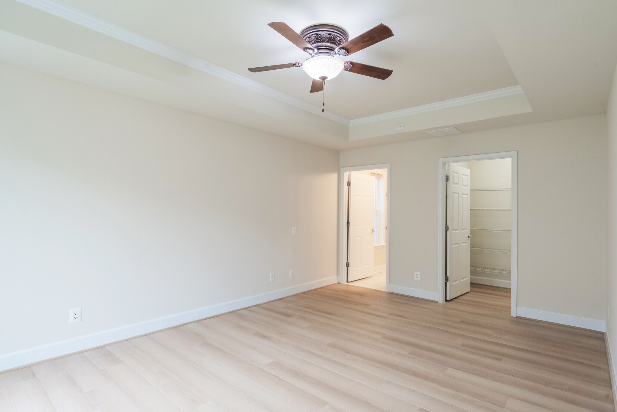 PRIMARY BEDROOM W/TRAY CEILING - 8934 Yellow Daisy Pl