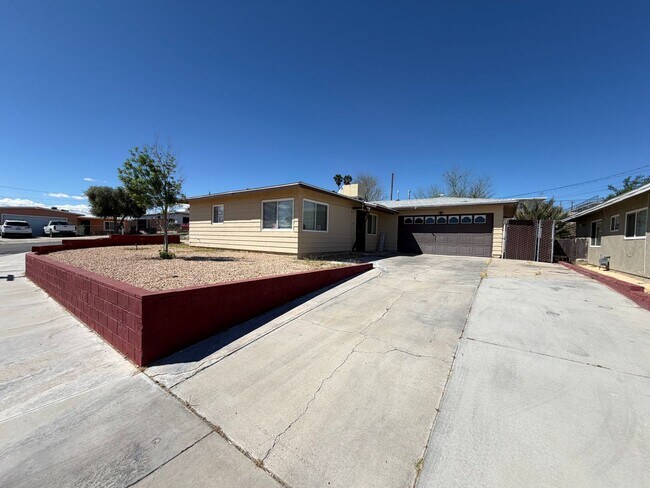 Building Photo - 3 Bedroom 2 Bathroom House with Central A/C , 2 Car Garage and Beautiful Backyard with Covered Patio