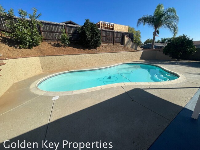 Building Photo - Nicely renovate corner property with a pool!