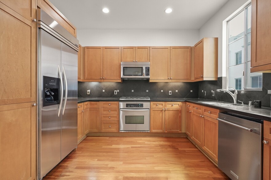 Kitchen with stainless steel appliances - 5400 Playa Vista Dr