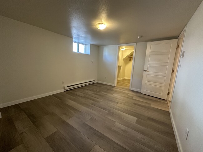 Bedroom 4: 10'5" x 13'3" bedroom with walk-in closet - 1137 E Platte Ave