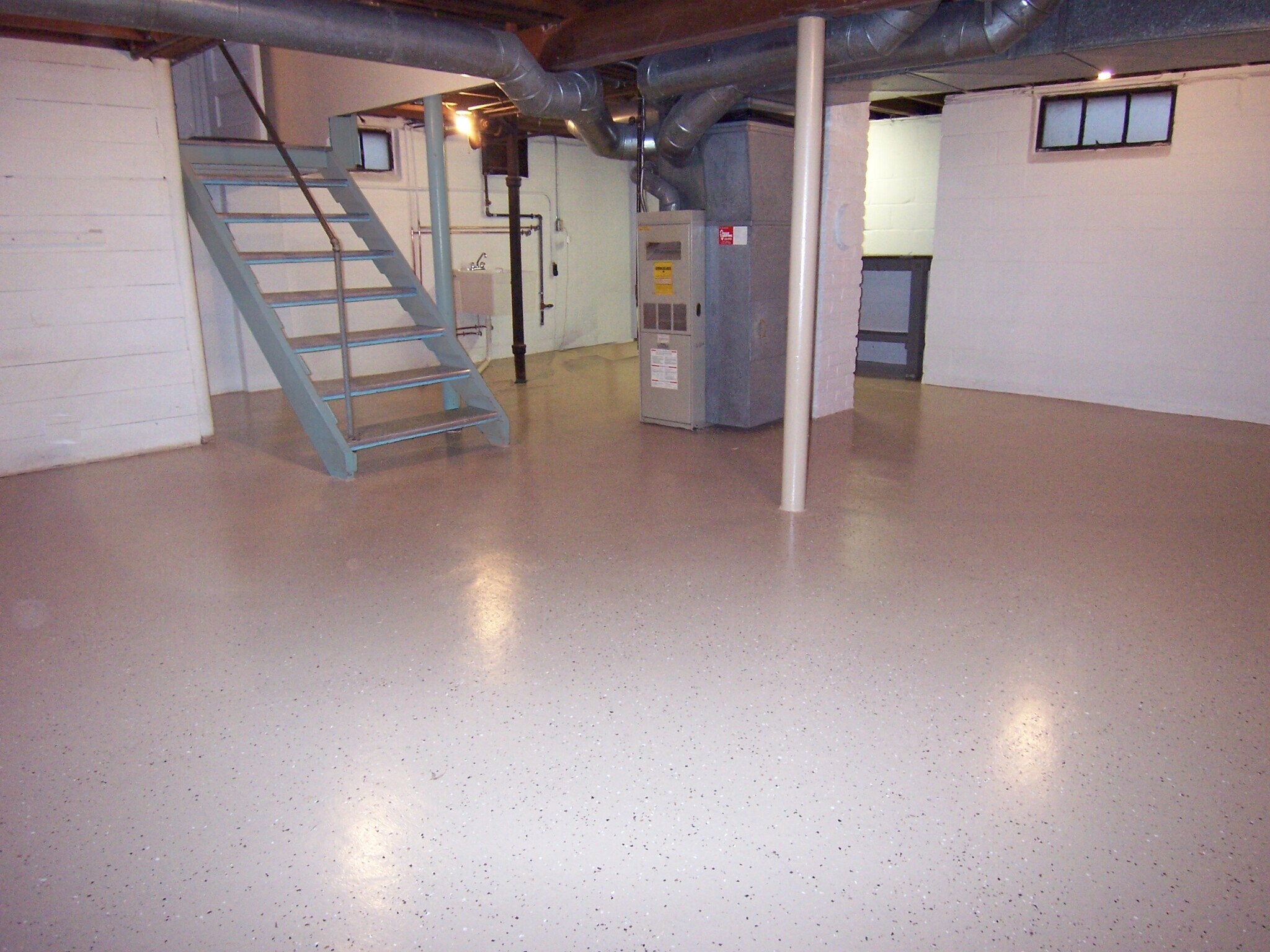 Basement, with laundry hook ups for gas or electric, and and laundry sink. - 4442 Caroline Ave