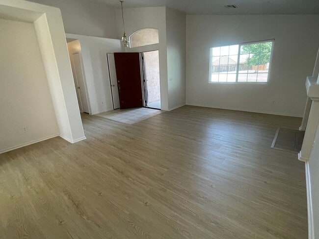 Building Photo - Adelanto Home-3 Bedrooms,2 Bathrooms, Laminate Floors, Indoor Laundry Room, Large Back Yard