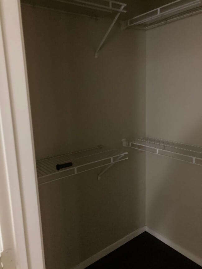 Building Photo - Gated community just minutes south of the strip, 2br/2bath, 2nd floor condo.