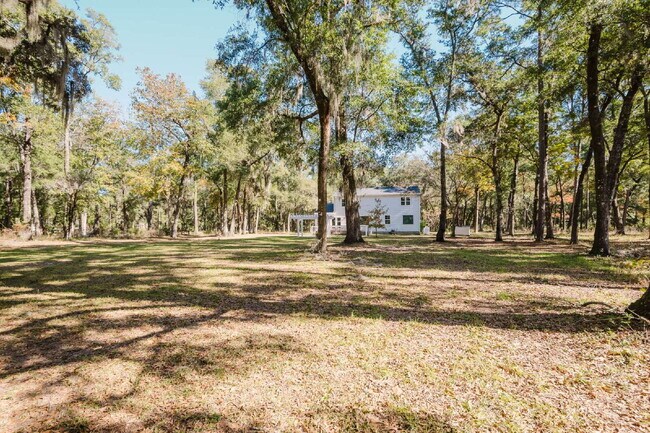 Building Photo - Secluded Four Bedroom Home on Seven Acres in Midway Farms!