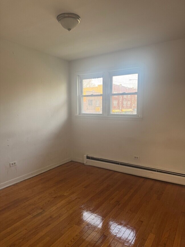 Building Photo - 8300 S Vernon Ave