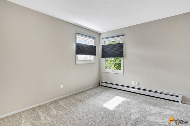 Building Photo - Spacious and bright condo located in a quiet area that boasts the perfect combination of style an...